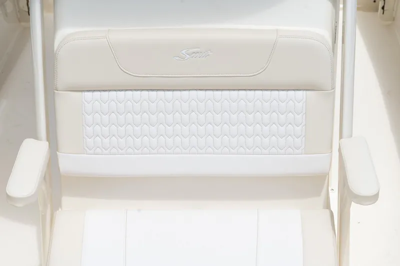 Slide: The Image of 2026 Scout 215 XSF boat seat with elegant white upholstery and armrests. - 16