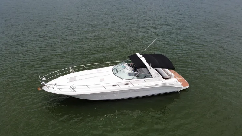 Slide: The Image of 1997 Sea Ray 400 Sundancer docked in marina, Plano, Texas. - 1