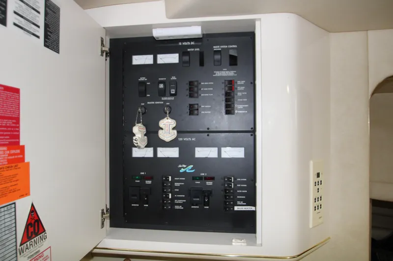 Slide: The Image of Bathroom interior of 1997 Sea Ray 400 Sundancer yacht, featuring shower and sink area. - 29