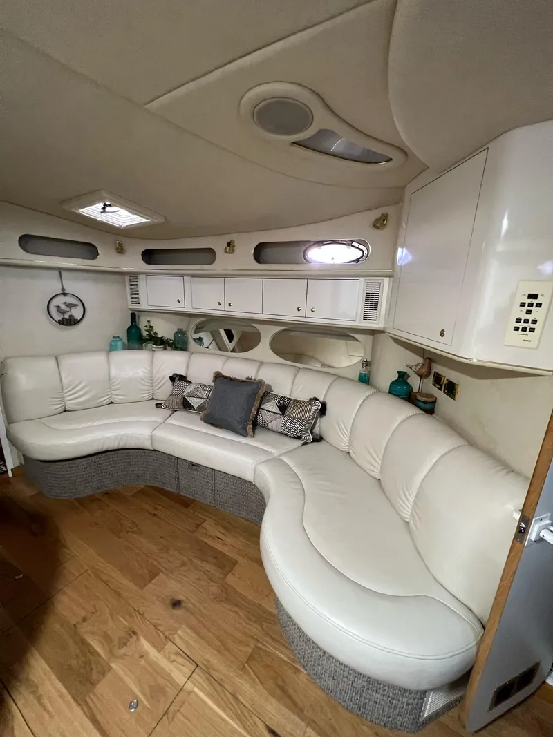 Slide: The Image of Interior of 1997 Sea Ray 400 Sundancer yacht with kitchen and stairs. - 7