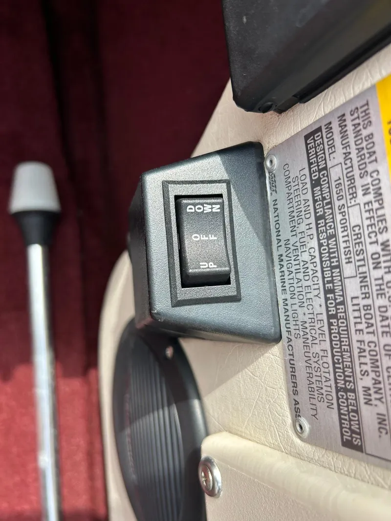 Slide: The Image of Switch panel on a 1997 Crestliner 1650 Sportfish boat interior. - 5