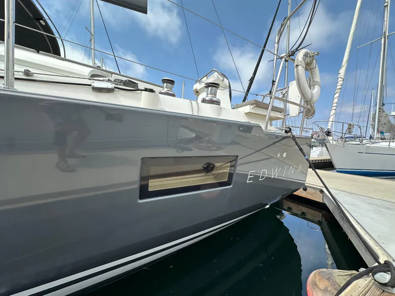 Slide: The Image of 2018 Jeanneau 54 sailboat "Edwina" docked at marina, side view. - 19