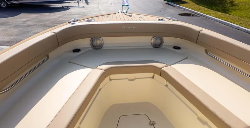 Slide: The Image of 2025 Chris-Craft Catalina 28 boat interior with tan seating and sleek design. - 31