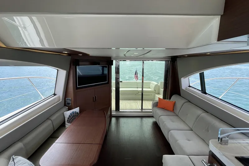 Slide: The Image of Luxurious interior of 2015 Sea Ray 510 Fly yacht with modern seating and ocean view. - 12