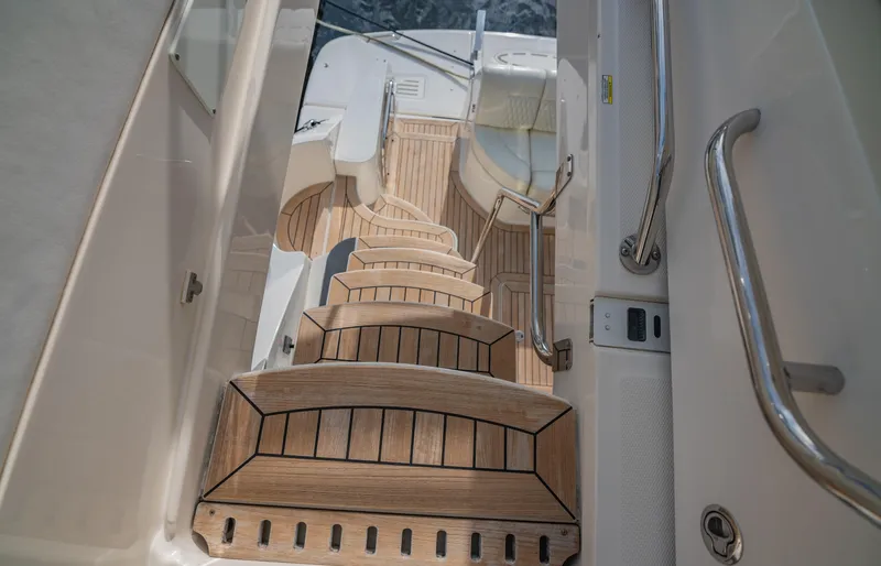 Slide: The Image of Staircase on 2015 Sea Ray 510 Fly yacht with teak decking. - 21