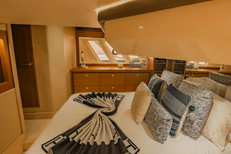 Slide: The Image of Luxurious bedroom interior of 2015 Sea Ray 510 Fly yacht with elegant decor. - 34