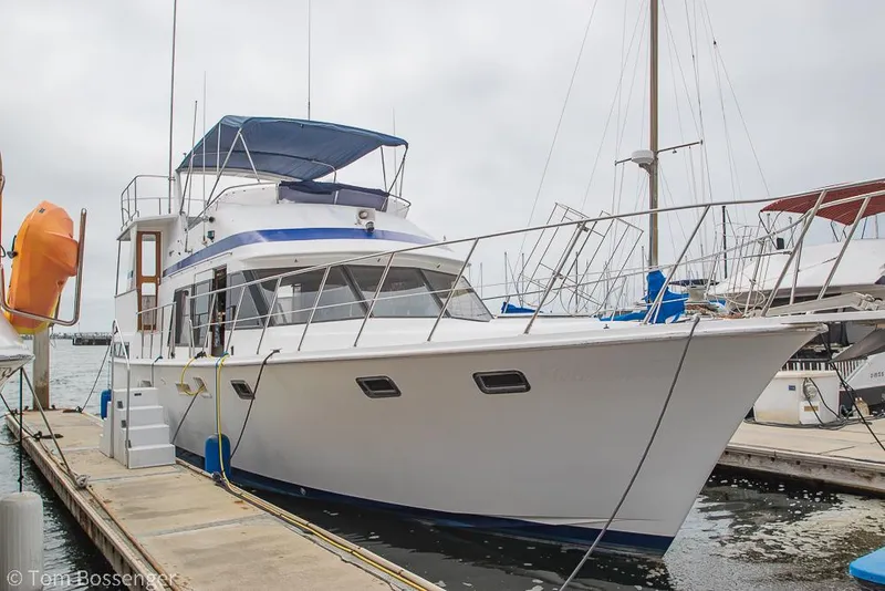 Slide: The Image of 1987 Lien Hwa 47 Elegant MKII Motoryacht docked at marina. - 2