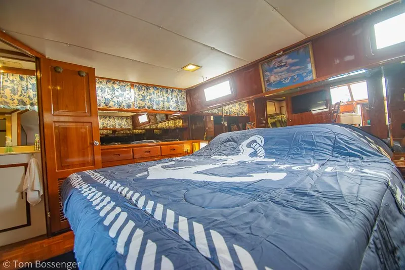 Slide: The Image of Interior of 1987 Lien Hwa 47 Elegant MKII Motoryacht bedroom with nautical decor. - 24