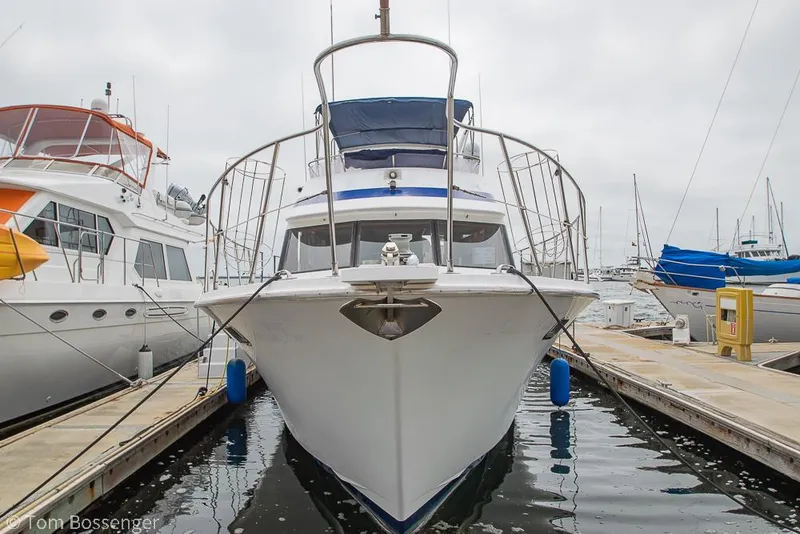 Slide: The Image of 1987 Lien Hwa 47 Elegant MKII Motoryacht docked at marina, front view. - 3