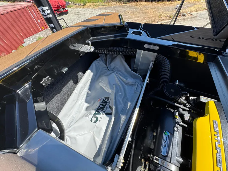 Slide: The Image of Interior view of 2025 Centurion RI 245 boat engine compartment with ballast system. - 11