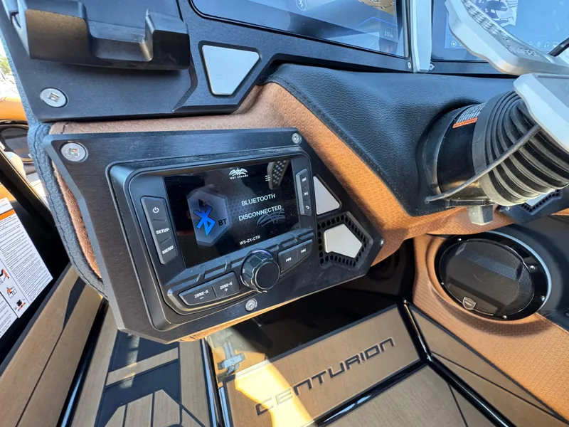 Slide: The Image of 2025 Centurion RI 245 dashboard with Bluetooth stereo system and modern controls. - 21