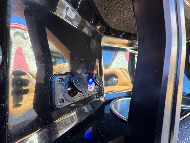 Slide: The Image of Close-up of Centurion RI 245 boat's USB charging port, 2025 model. - 30