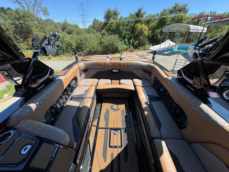 Slide: The Image of Luxurious interior of 2025 Centurion RI 245 boat with tan seating and sleek design. - 36