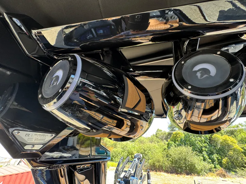 Slide: The Image of 2025 Centurion RI 245 boat speakers with sleek black design and reflective finish. - 38