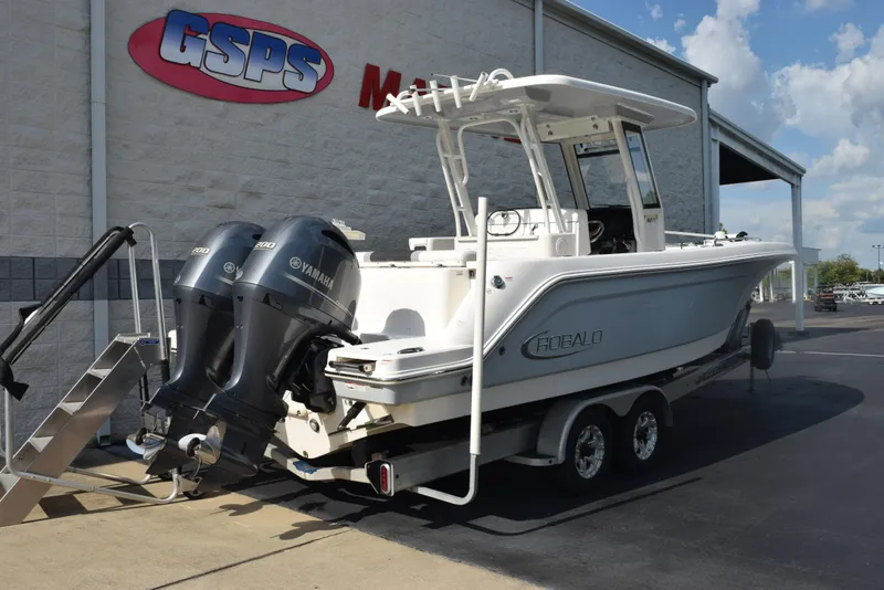 Slide: The Image of 2019 Robalo R272 Center Console boat with twin Yamaha engines at dealership. - 4