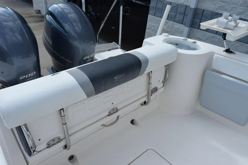 Slide: The Image of 2019 Robalo R272 Center Console boat with Yamaha 200 engines, rear seating view. - 9
