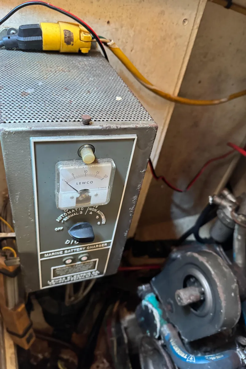 Slide: The Image of 1985 Bluewater Ingrid 38 marine battery charger in engine compartment. - 26