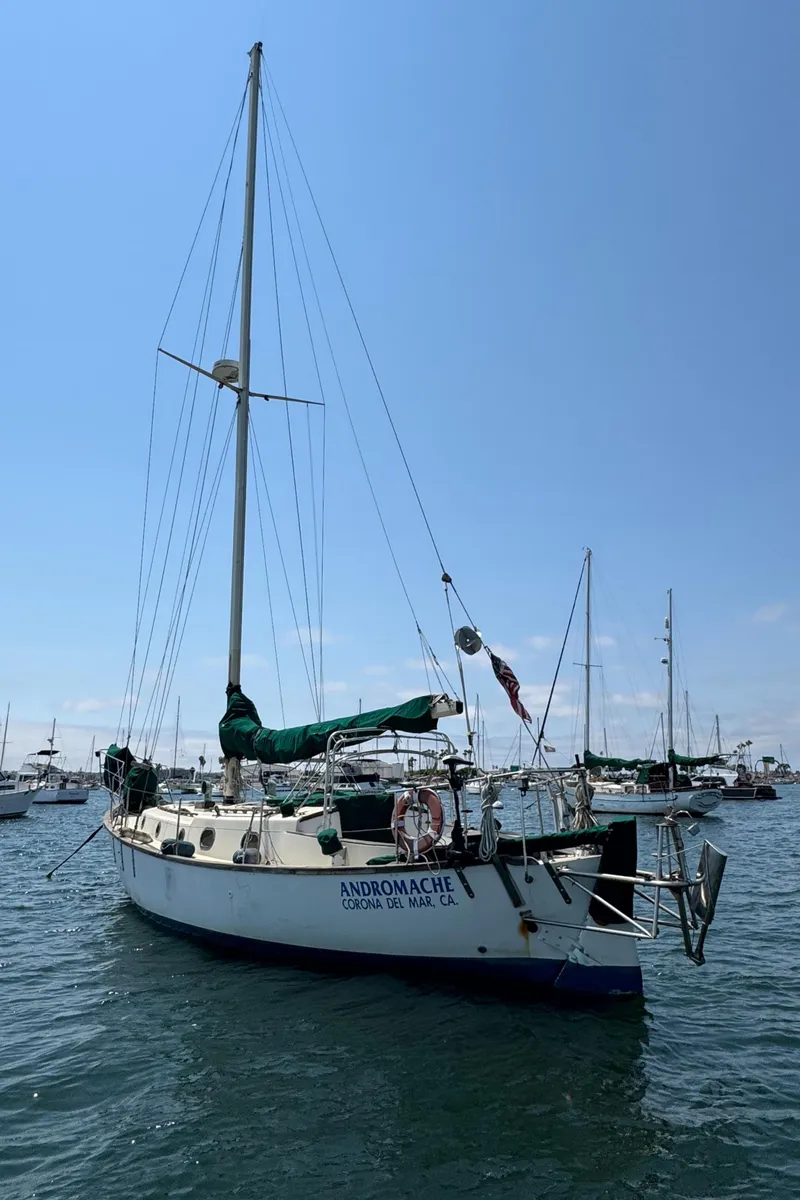 Slide: The Image of Sailboat "Andromache," Bluewater Ingrid 38, 1985, anchored in a sunny marina. - 3