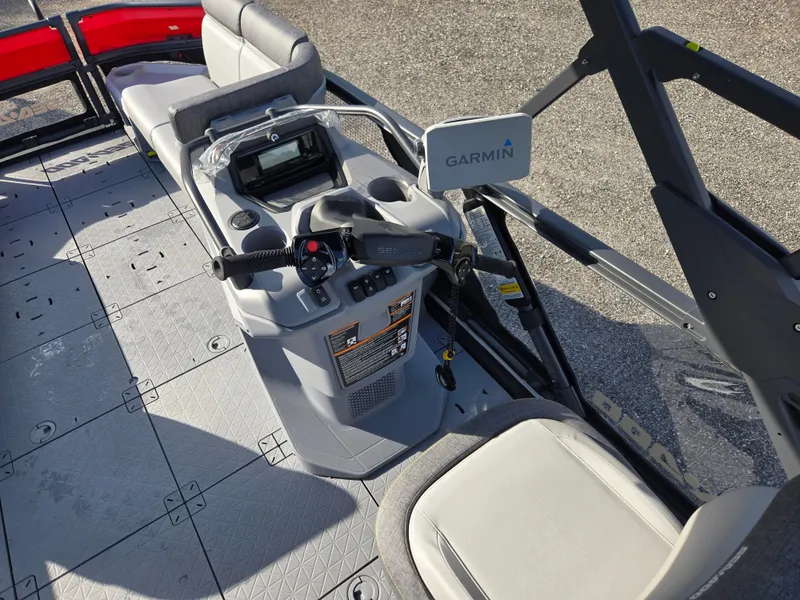 Slide: The Image of 2023 Sea-Doo Switch Cruise 18 dashboard with Garmin navigation system. - 11