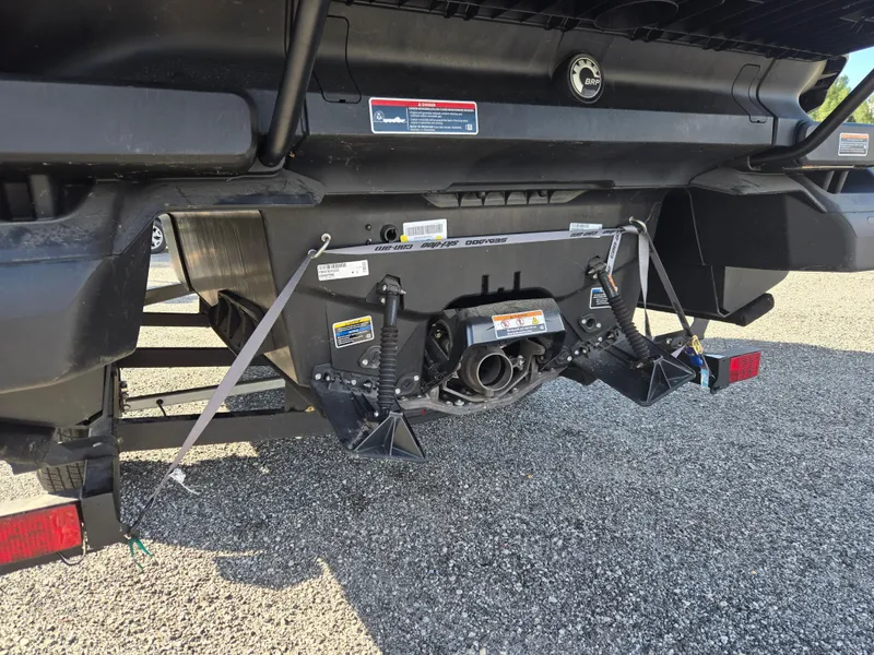 Slide: The Image of Rear view of 2023 Sea-Doo Switch Cruise 18, showcasing its propulsion system and trailer attachment. - 14