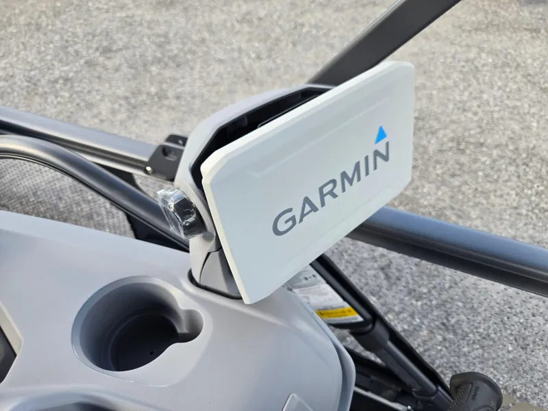 Slide: The Image of Garmin device on 2023 Sea-Doo Switch Cruise 18, featuring a sleek design and cup holder. - 6