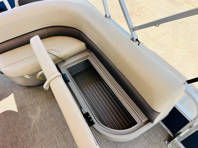 Slide: The Image of 2023 Sun Tracker Bass Buggy 18 DLX boat seat with open storage compartment. - 17