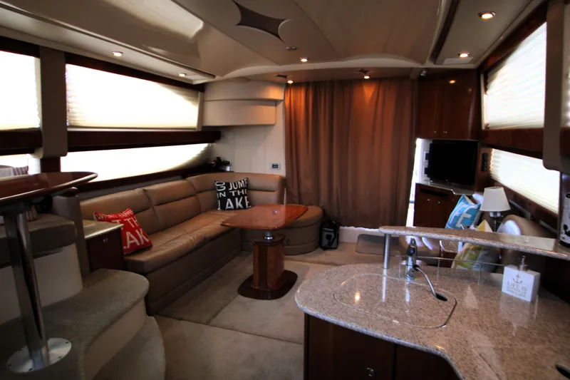 Slide: The Image of Luxurious interior of a 2007 Meridian 391 Sedan yacht with cozy seating and modern amenities. - 10