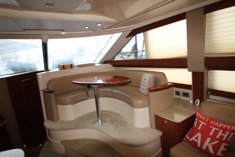 Slide: The Image of Interior of 2007 Meridian 391 Sedan yacht with cozy seating and round table. - 14