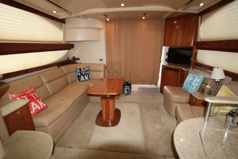 Slide: The Image of Luxurious interior of a 2007 Meridian 391 Sedan yacht with plush seating and elegant decor. - 2