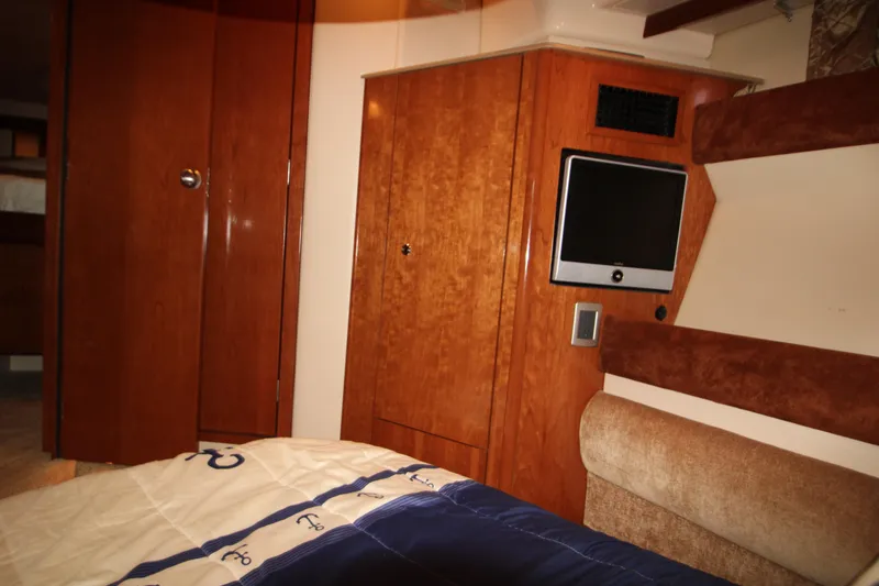 Slide: The Image of Interior of 2007 Meridian 391 Sedan with wood paneling and built-in TV. - 27