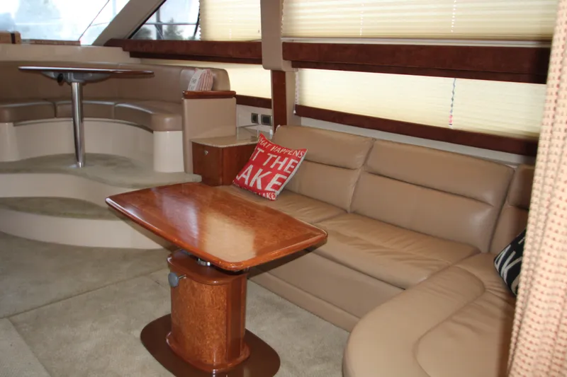 Slide: The Image of Luxurious interior of 2007 Meridian 391 Sedan with leather seating and wooden table. - 3