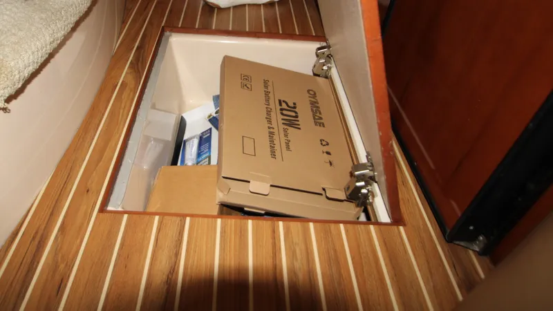 Slide: The Image of Storage compartment in 2007 Meridian 391 Sedan with solar panel box inside. - 37