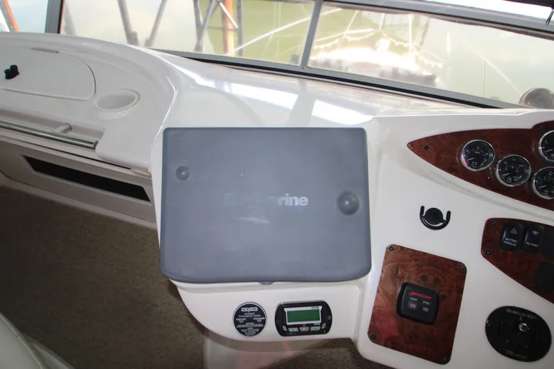 Slide: The Image of 2007 Meridian 391 Sedan helm with navigation equipment and control panel. - 41