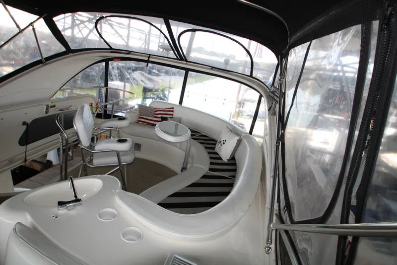 Slide: The Image of Luxurious interior of a 2007 Meridian 391 Sedan yacht with stylish seating and modern design. - 49