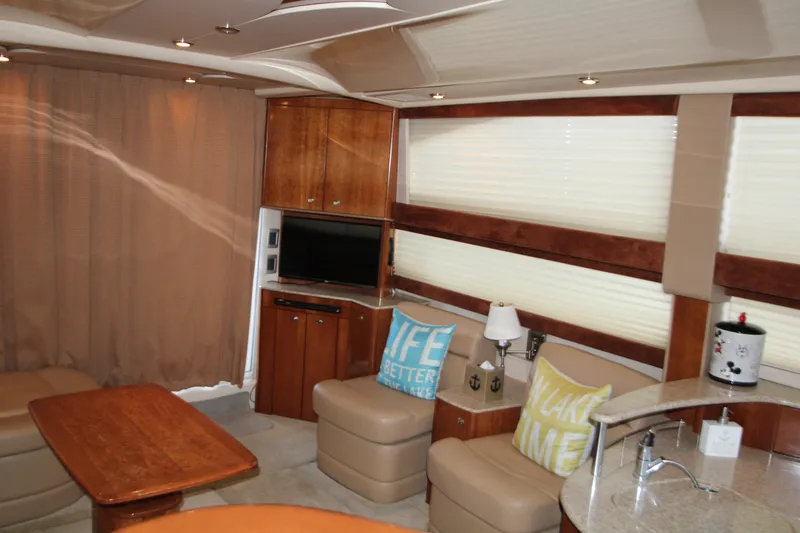 Slide: The Image of Luxurious interior of a 2007 Meridian 391 Sedan yacht with cozy seating and modern amenities. - 5