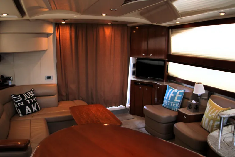 Slide: The Image of Luxurious interior of a 2007 Meridian 391 Sedan yacht with cozy seating and modern decor. - 6