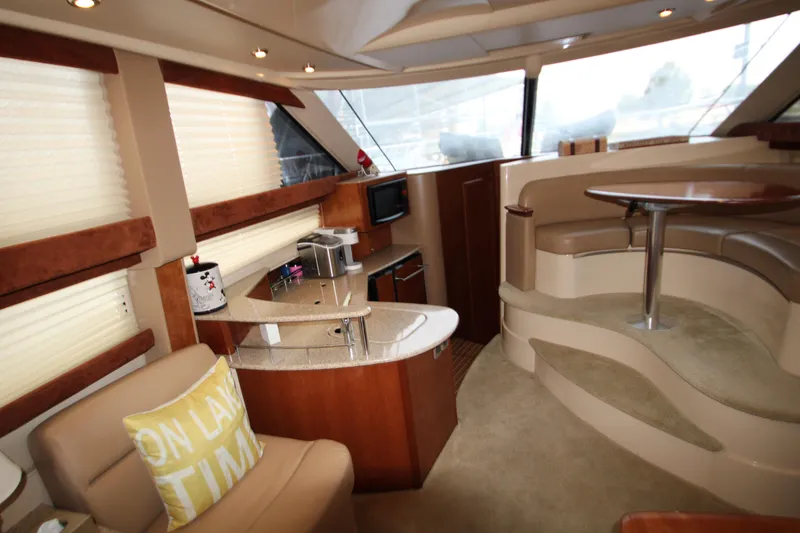 Slide: The Image of Luxurious interior of a 2007 Meridian 391 Sedan yacht with modern amenities and elegant design. - 9