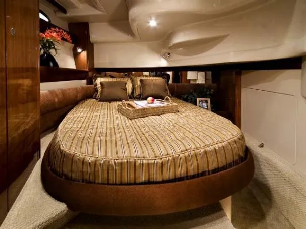Slide: The Image of Luxurious bedroom interior of 2007 Meridian 391 Sedan yacht with elegant bedding and decor. - 97