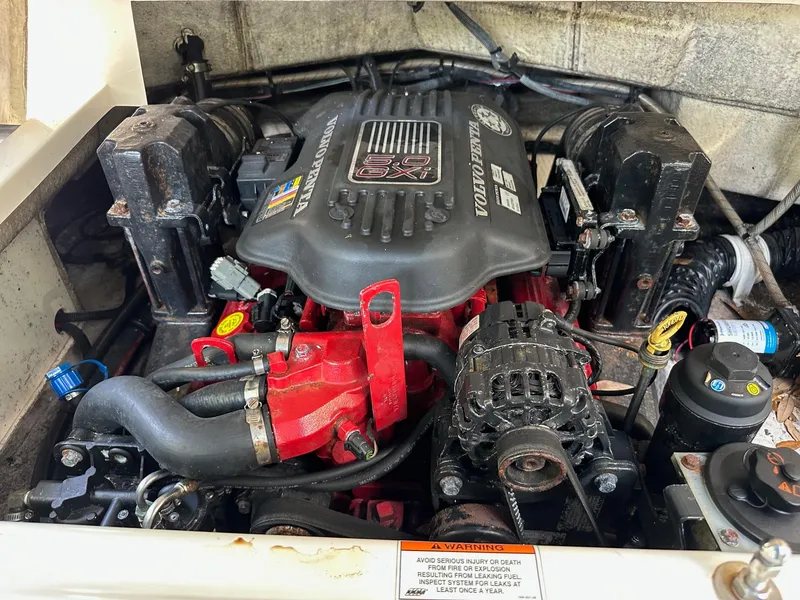 Slide: The Image of Engine compartment of a 2008 Regal 2250 Cuddy boat with Volvo Penta motor. - 13