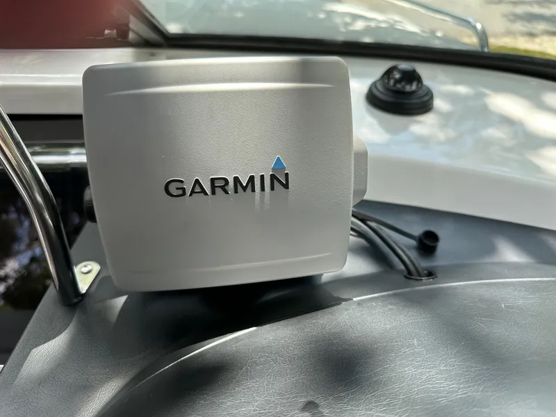 Slide: The Image of Garmin device on 2008 Regal 2250 Cuddy dashboard, close-up view. - 29