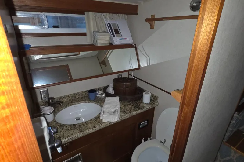 Slide: The Image of Bathroom interior of 1985 Chris-Craft 500 Constellation Motor Yacht with granite countertop. - 42