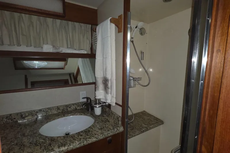 Slide: The Image of Bathroom interior of 1985 Chris-Craft 500 Constellation Motor Yacht with granite countertop. - 43