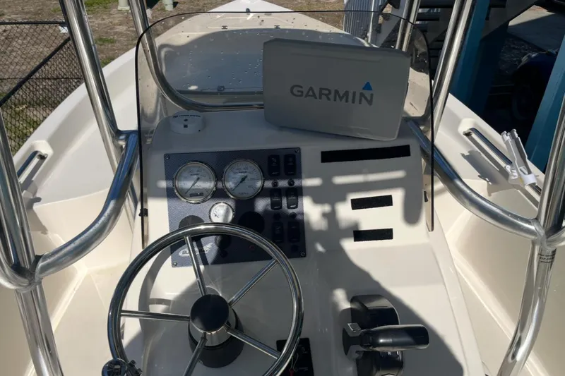 Slide: The Image of 2020 Bulls Bay 2000 boat console with Garmin navigation system and steering wheel. - 6