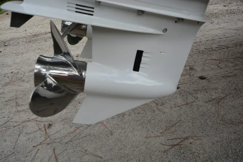 Slide: The Image of Close-up of a Parker 2420 boat propeller, 2025 model, on sandy ground. - 23