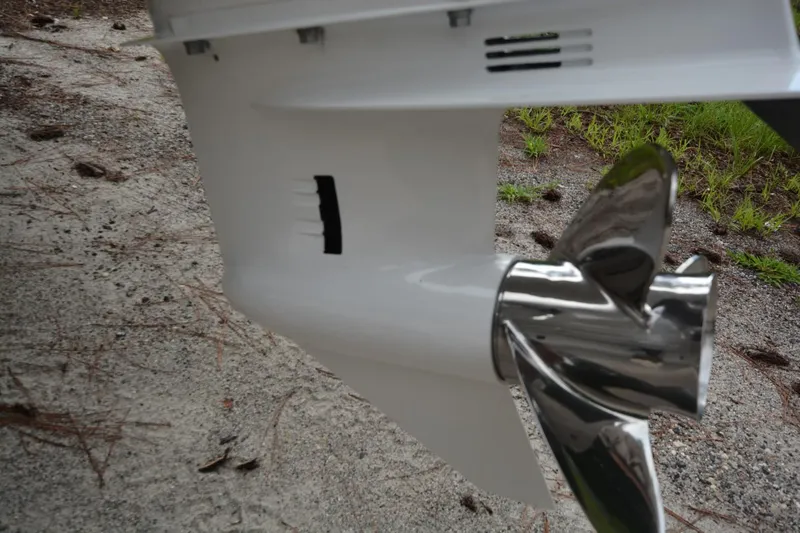 Slide: The Image of Close-up of a Parker 2420 boat propeller, 2025 model, on a gravel surface. - 26