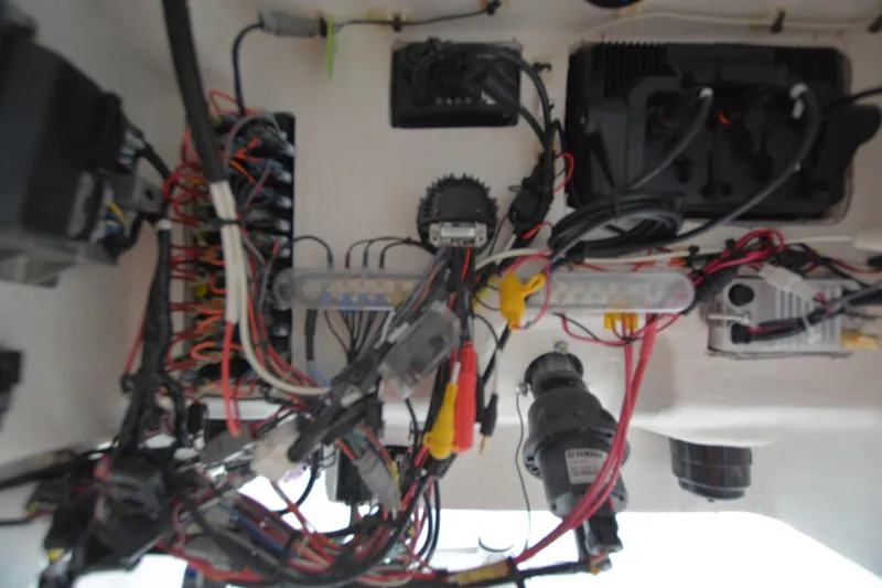 Slide: The Image of Wiring and components inside a Parker 2420, 2025 model, showcasing electrical connections. - 9