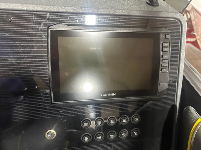 Slide: The Image of Garmin display on 2023 Manitou Explore 24 Navigator boat dashboard. - 10