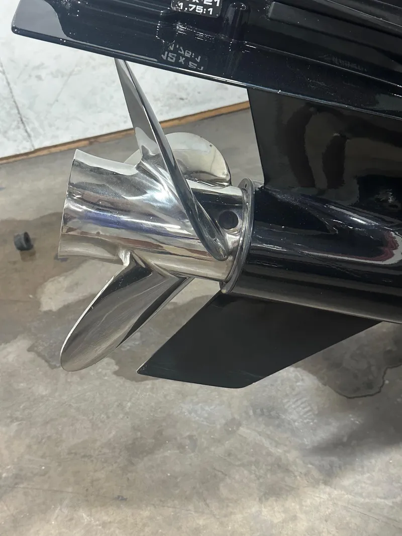 Slide: The Image of Close-up of a 2023 Manitou Explore 24 Navigator boat propeller. - 14