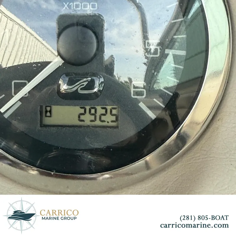 Slide: The Image of Close-up of a 2003 Sea Ray 220 Bow Rider tachometer reading 292.5 hours. - 19