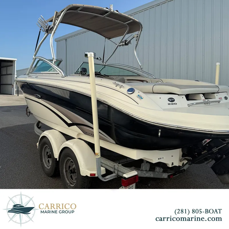 Slide: The Image of 2003 Sea Ray 220 Bow Rider on trailer at Carrico Marine Group. - 3